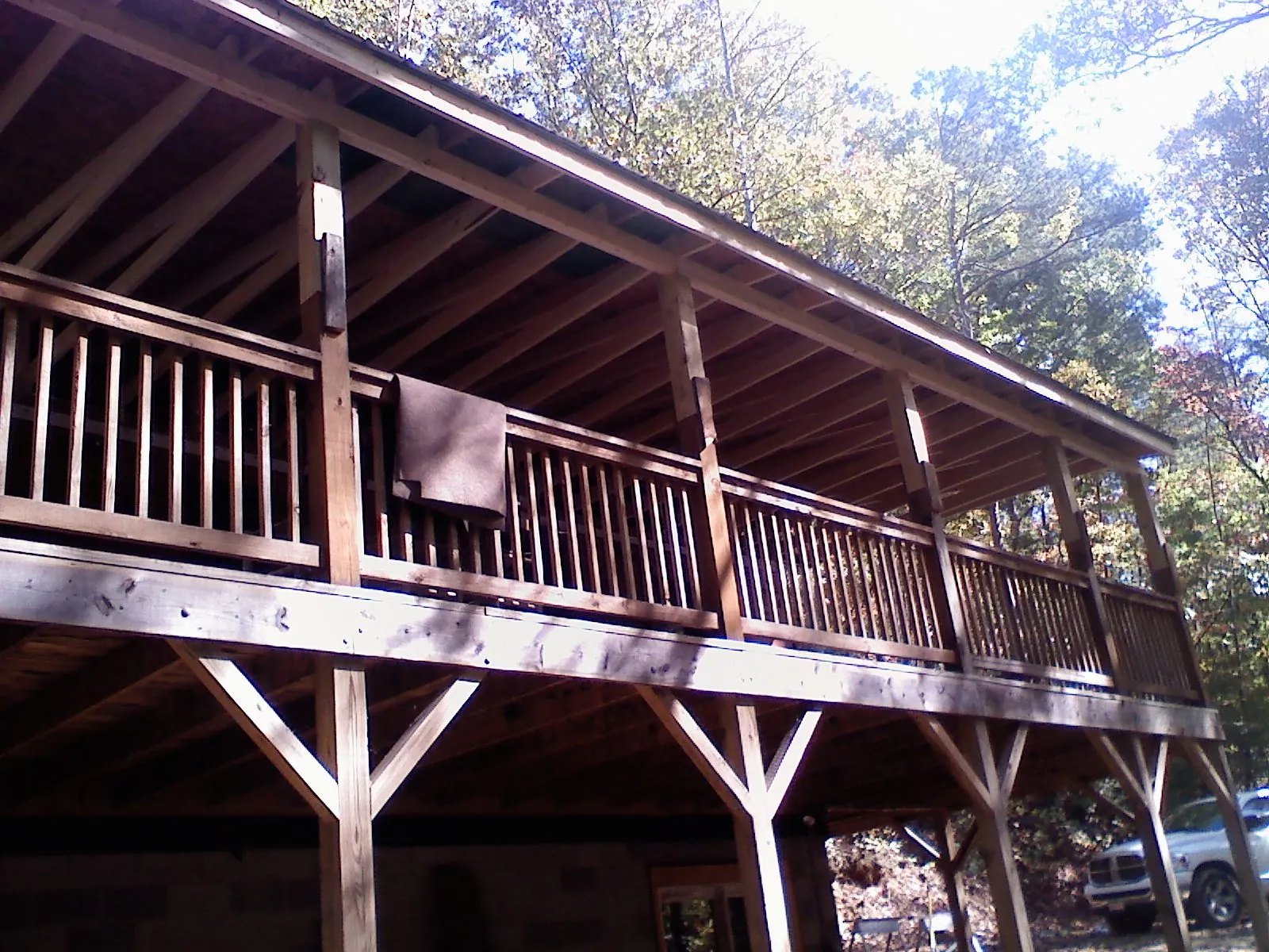 Timber framing under a new elevated porch and deck — Roof Leak Repair in North Easton by Roofing Brothers